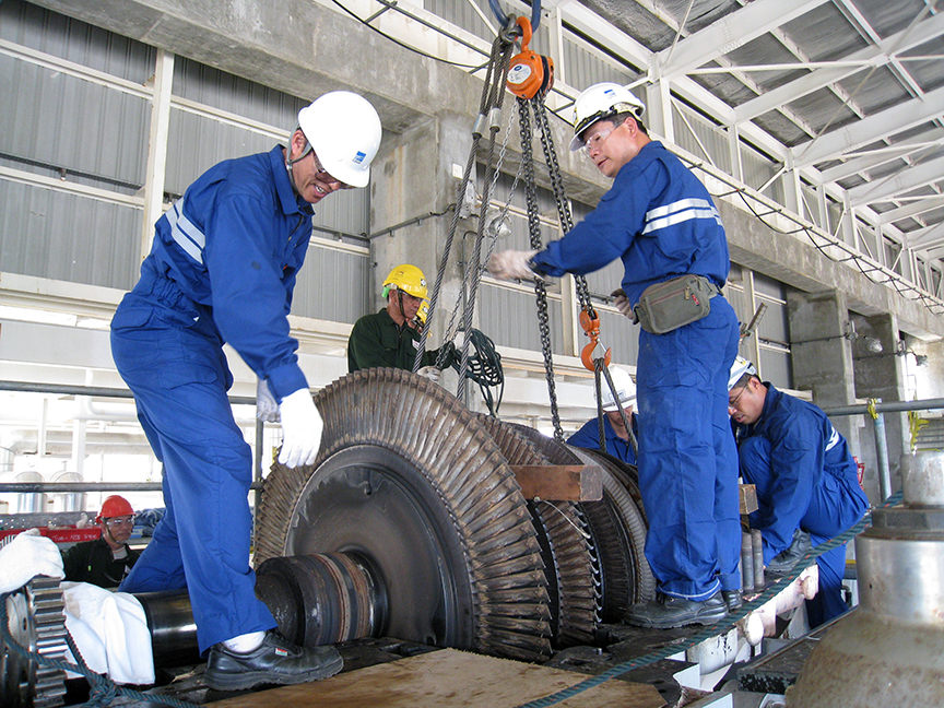field service employees servicing equipment